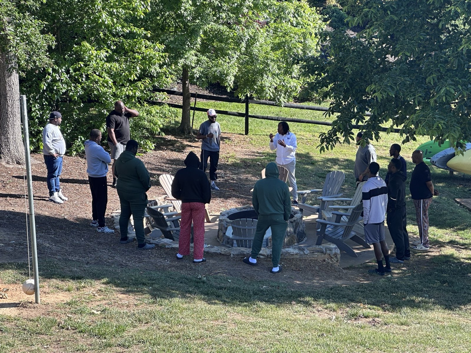 Fellows gathered on the lawn during the Athari retreat