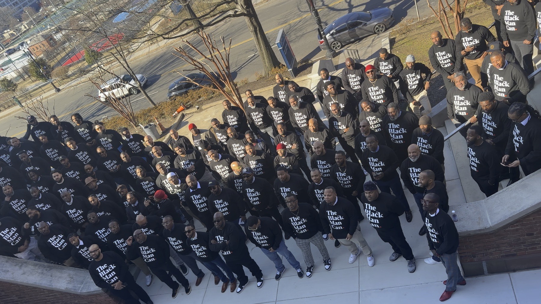 Black male educators gathered on the steps at the inaugural Capital Summit