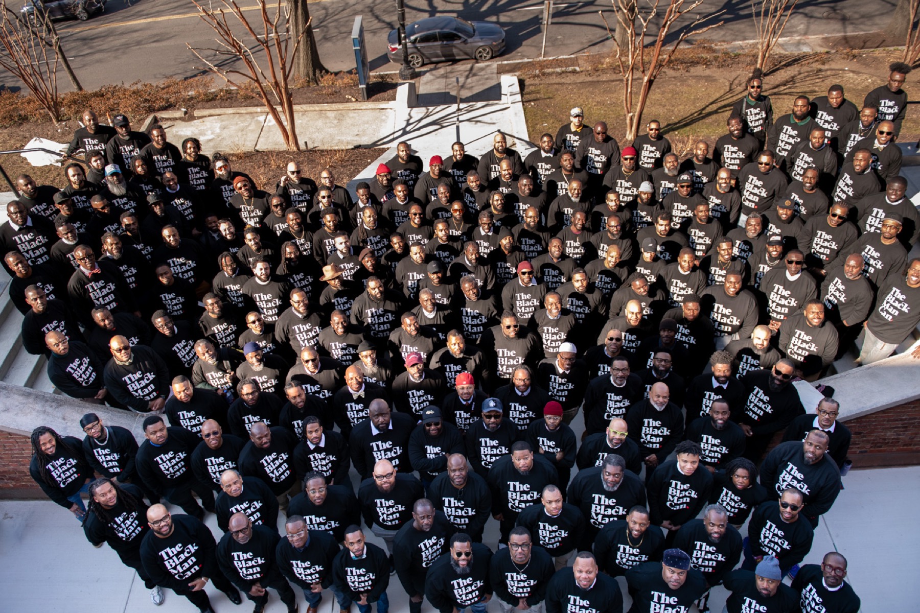 Hundreds of Black male educators gathered outside Howard University, seen from above