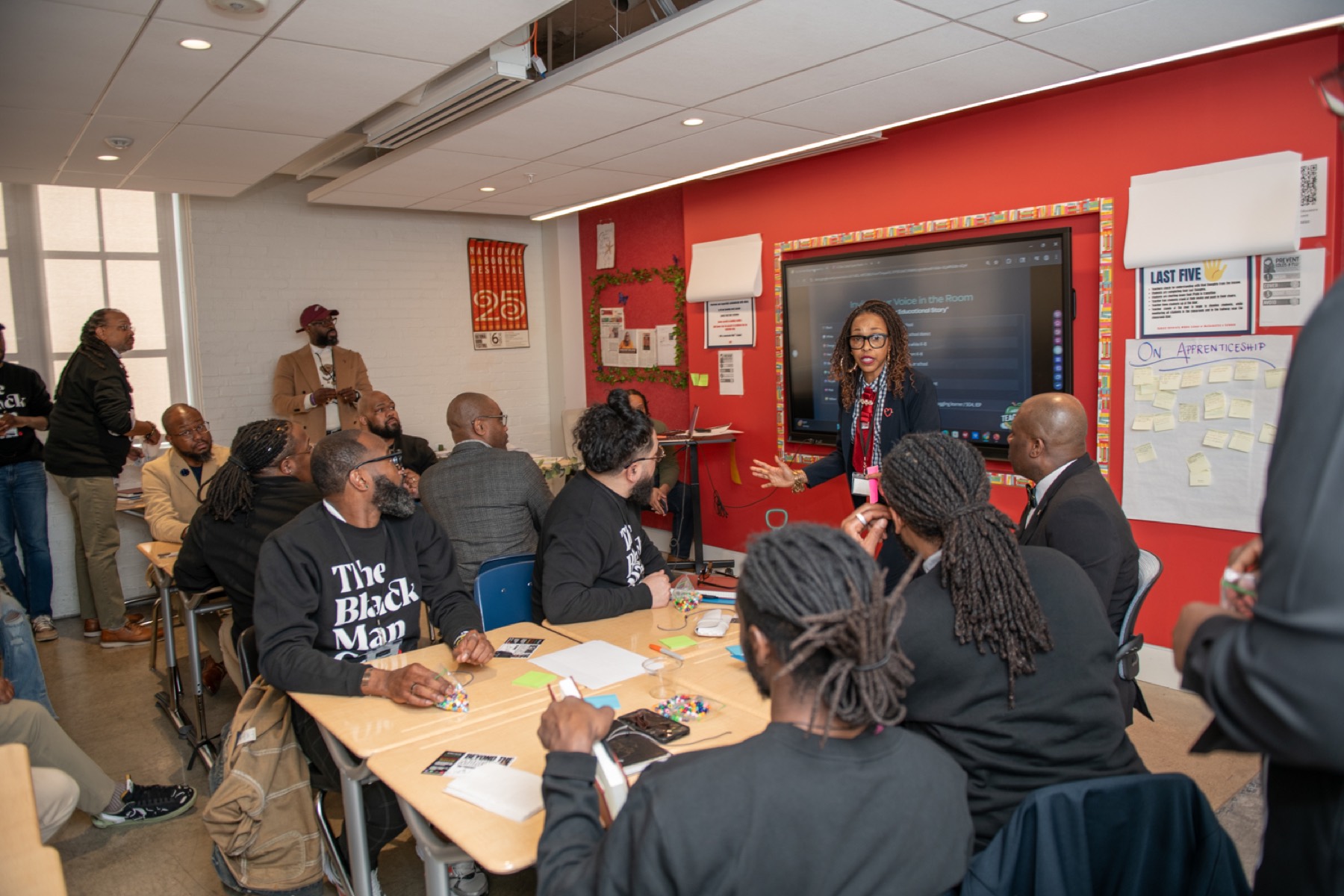 Educators at desks during a breakout session